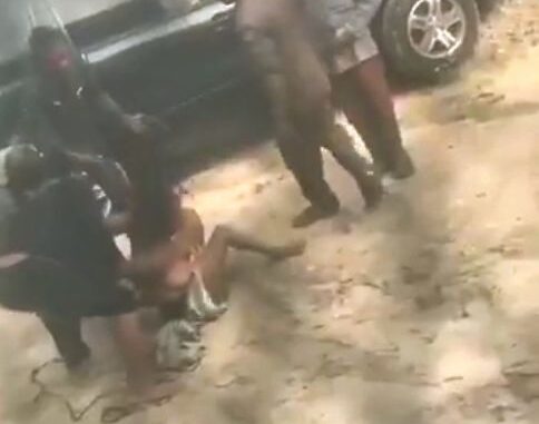 Boobs Out As Nigerian Police Strip Woman With Big Breasts Naked In Public (18+)