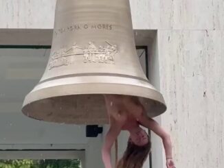 Naked Austrian Woman Hangs Inside Bell (18+)