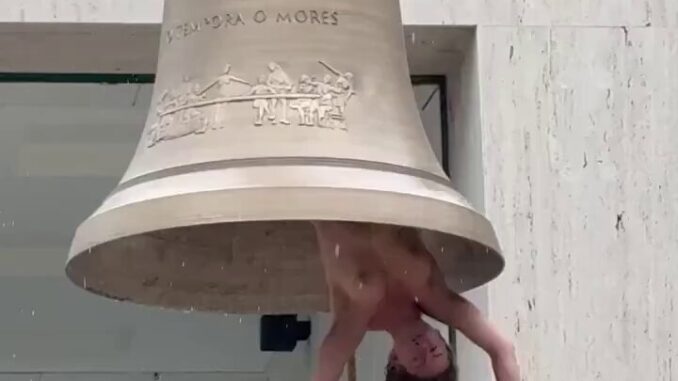 Naked Austrian Woman Hangs Inside Bell (18+)