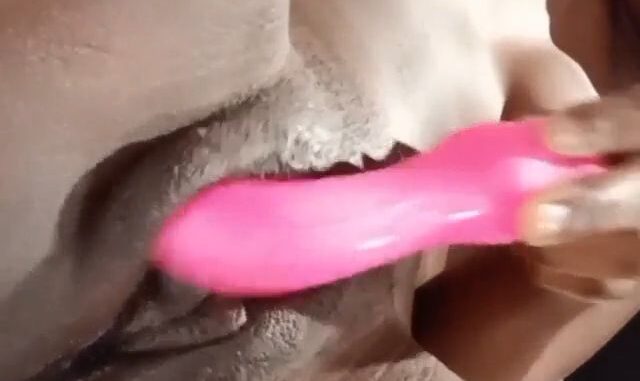Fucking her coochie with a toy!